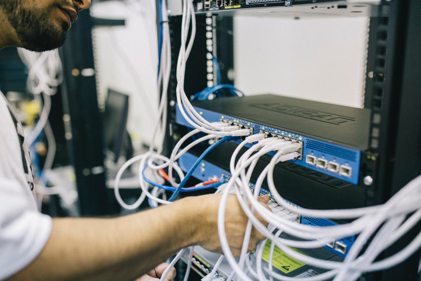 Field Engineer using zip ties