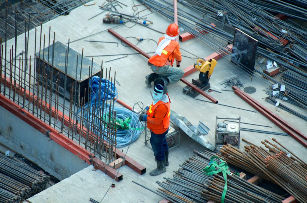 construction workers working with zip ties